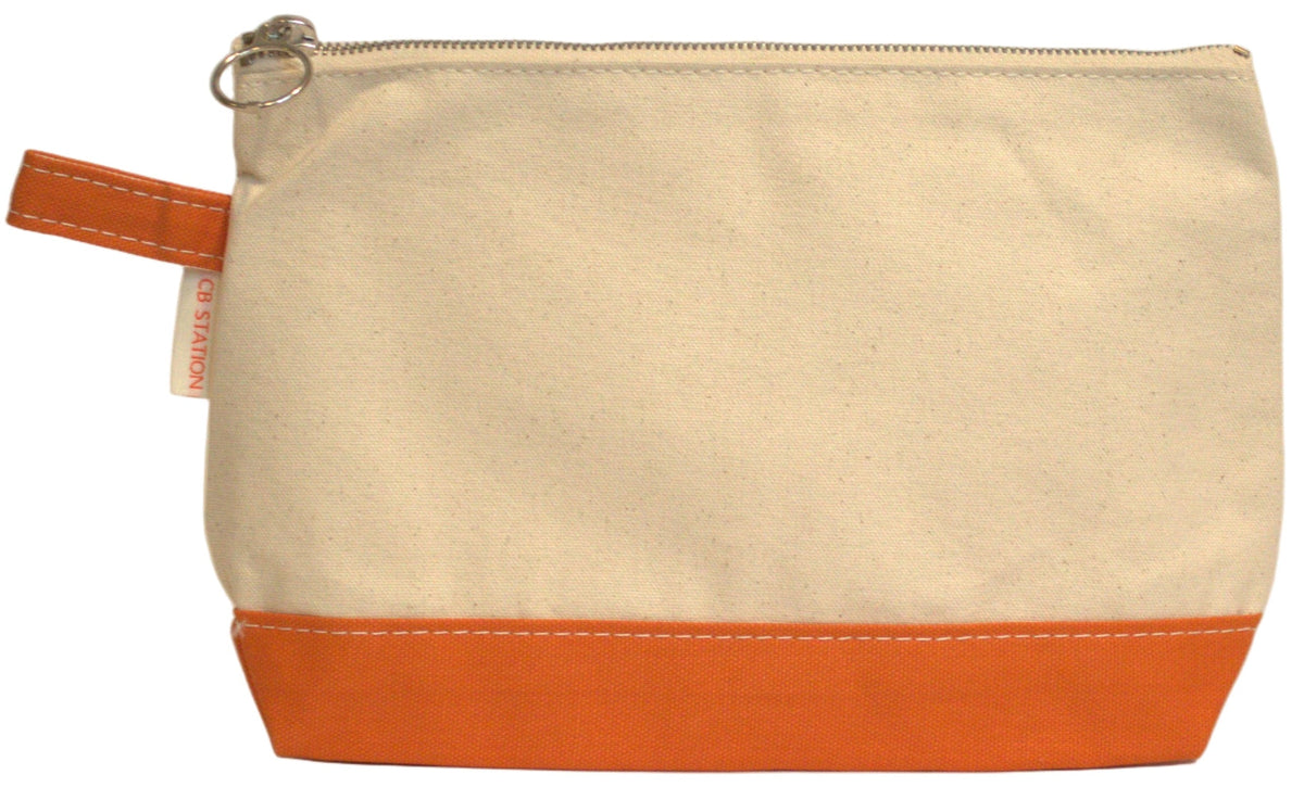 Beige and orange pouch on a beige background