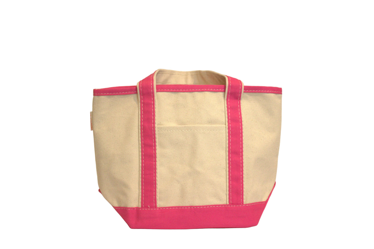 Beige tote bag with pink trim on a beige background