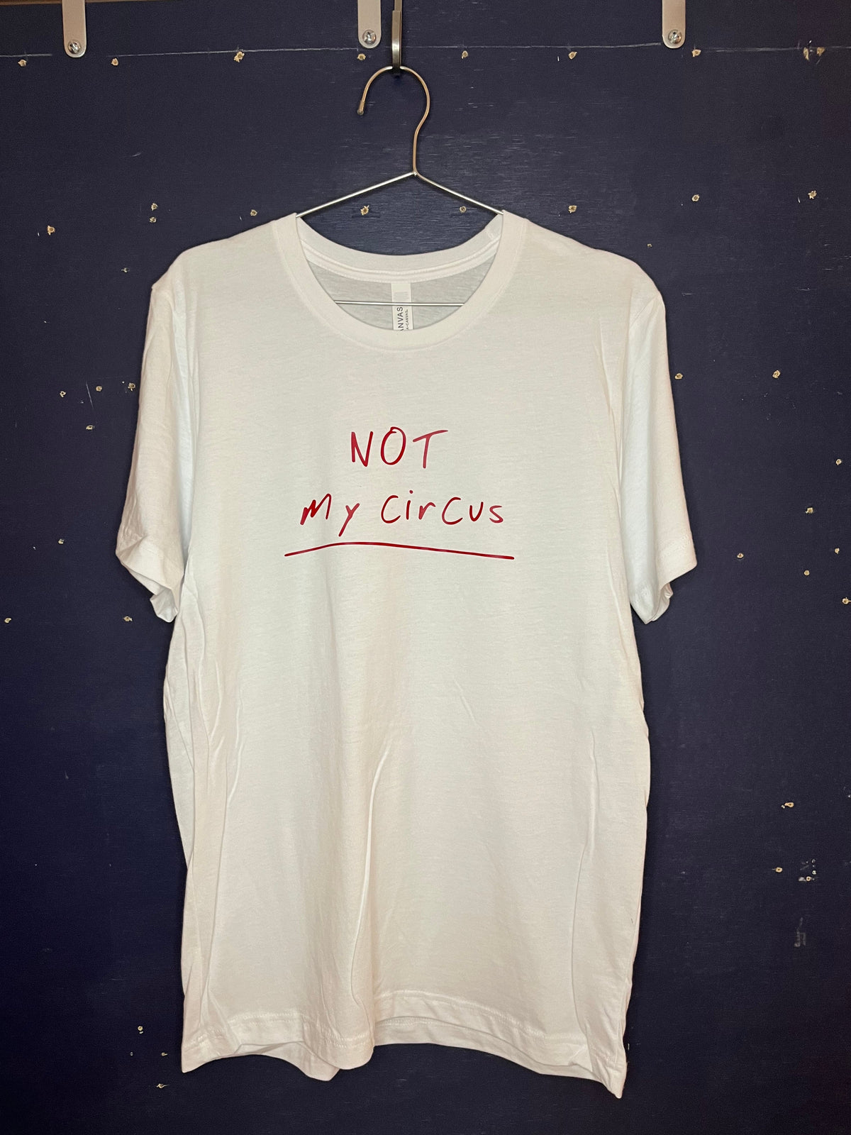 White t-shirt with 'Not My Circus' text